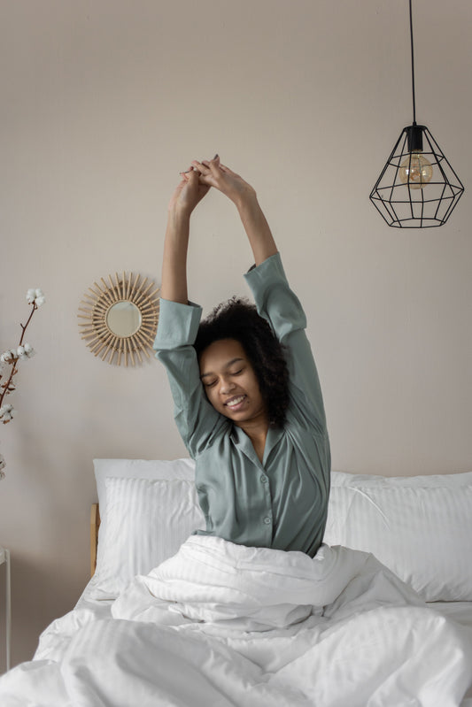 Image of a healthy woman waking up